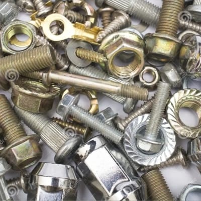Nuts and Bolts with other hardware items making background