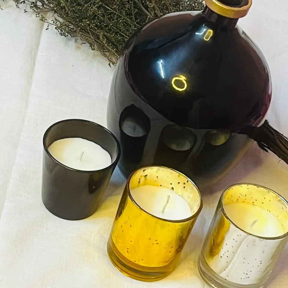 Black vase with candle