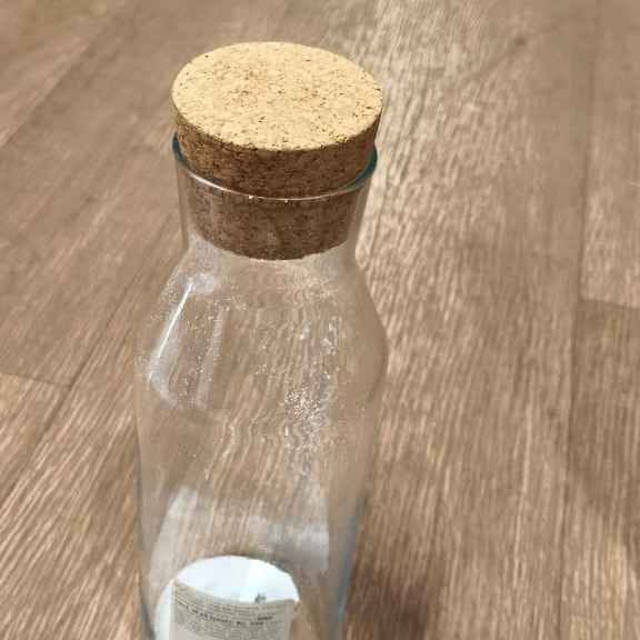 CONTAINER WITH STOPER